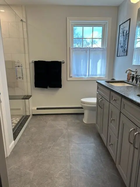 Dracut T whole house_bathroom A Bathroom in Dracut, MA